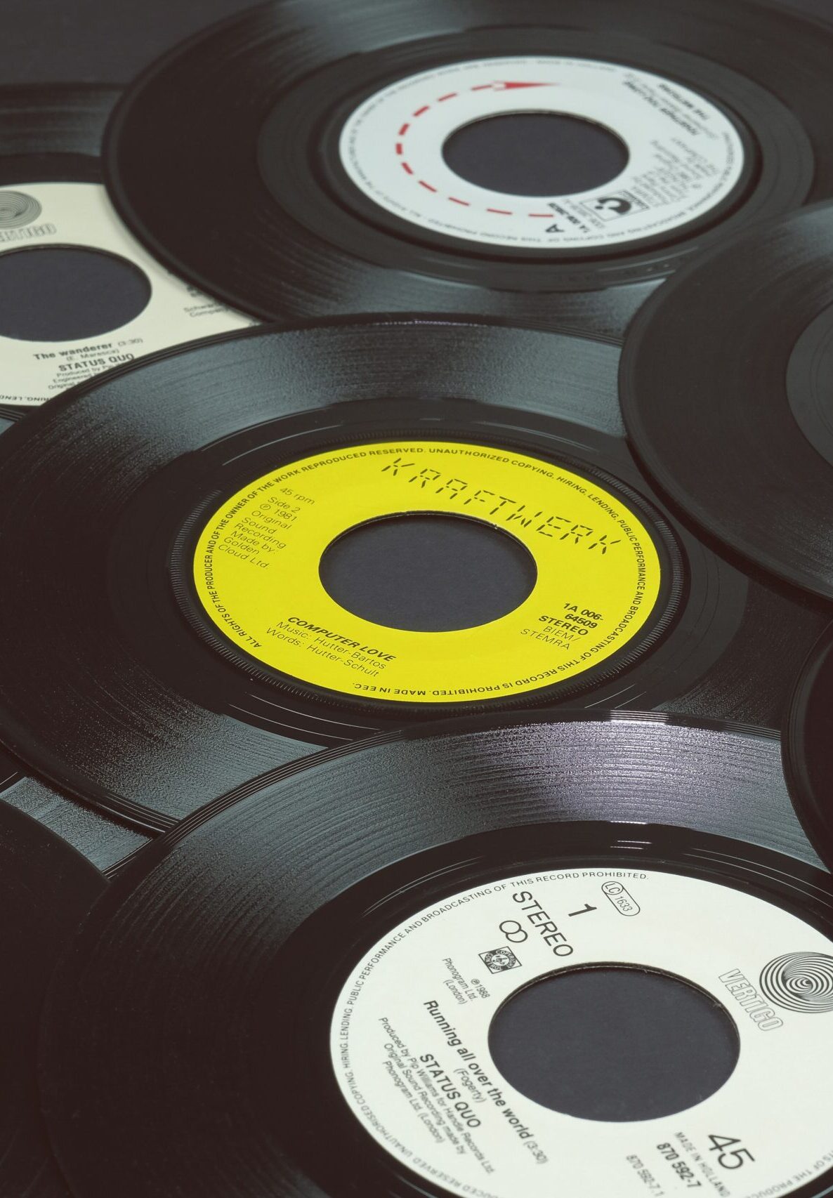 Vinyl records stacked on top of each other
